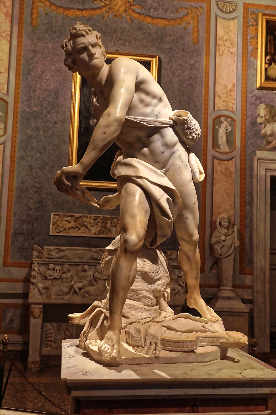Le David de Bernin, sculpture de Gian Lorenzo Bernini : David est saisi en pleine torsion, au moment de lancer sa pierre, le corps tendu et le…